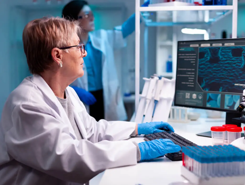 Clinical laboratory team reviewing diagnostic results